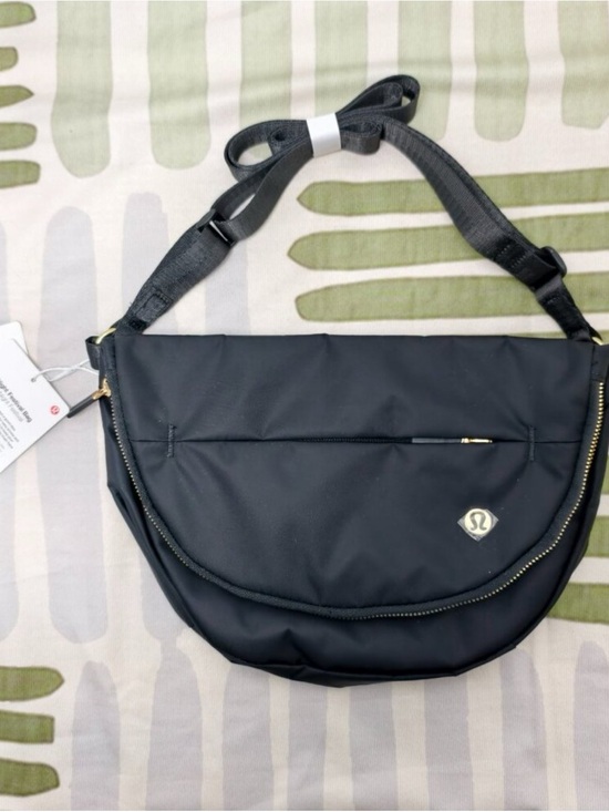 lululemon athletica Handbags - lululemon athletica Black Crossbody Messenger Bag with Gold Accents